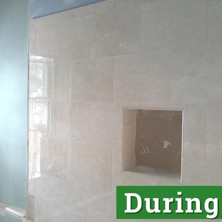 a shower wall in the process of being installed