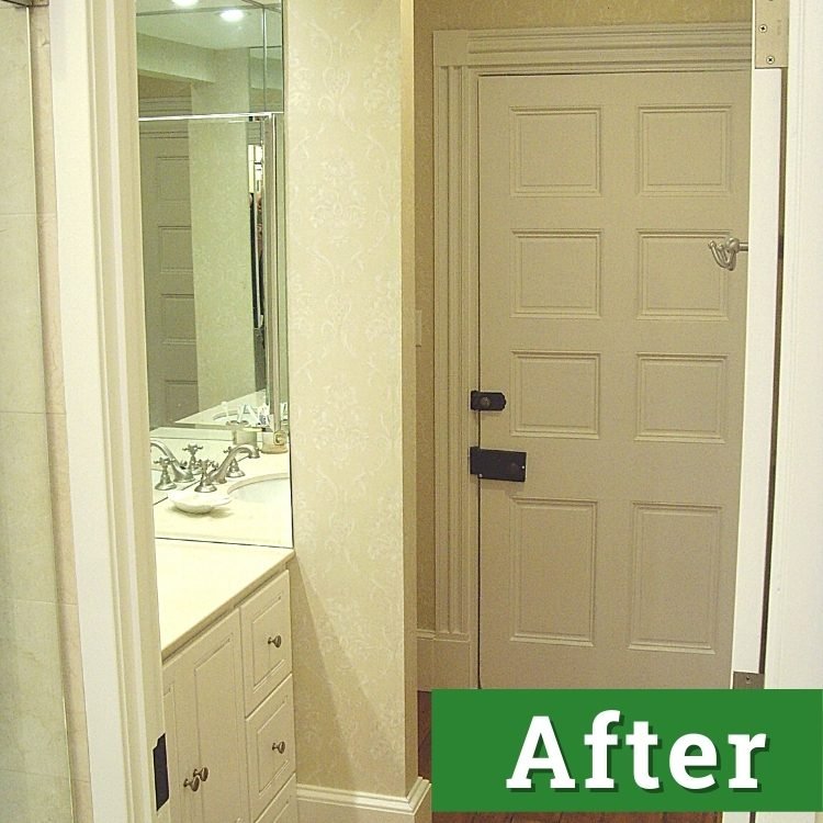 newly installed bathroom cabinetry and painted door