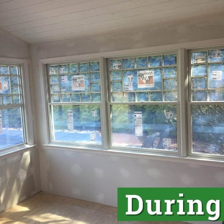 light filters in through windows of a newly built sunroom