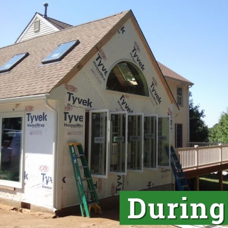 a custom built sunroom in mid progress with open windows