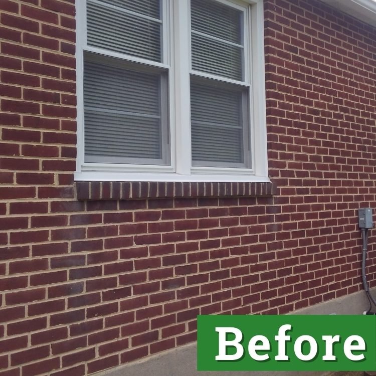 white double pane windows on a brick house