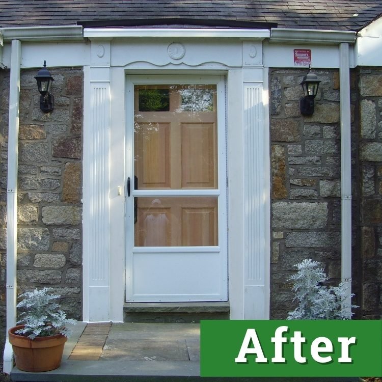 a new wooden door sits behind a white storm door