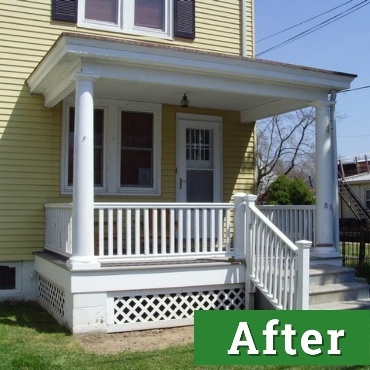 a newly renovated front porch with white railings and laticework