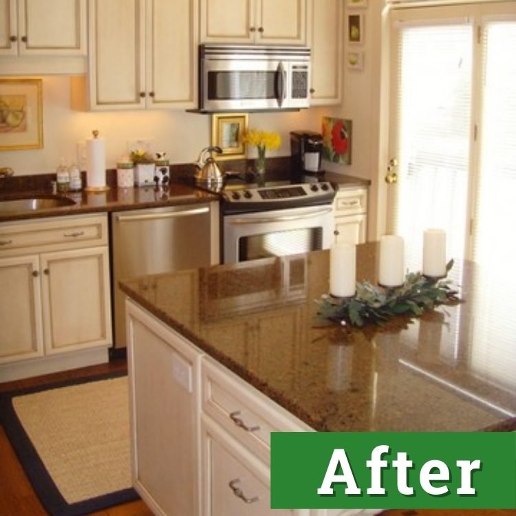 a newly remodeled kitchen with white cabinets and stainless steel appliances