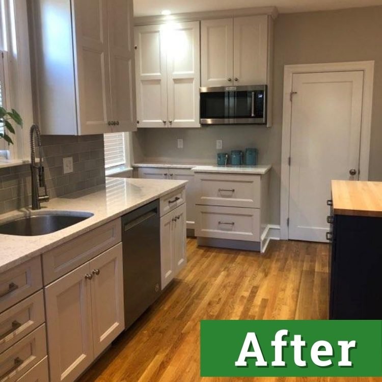 a newly renovated kitchen with white cabinets and stainless steel appliances