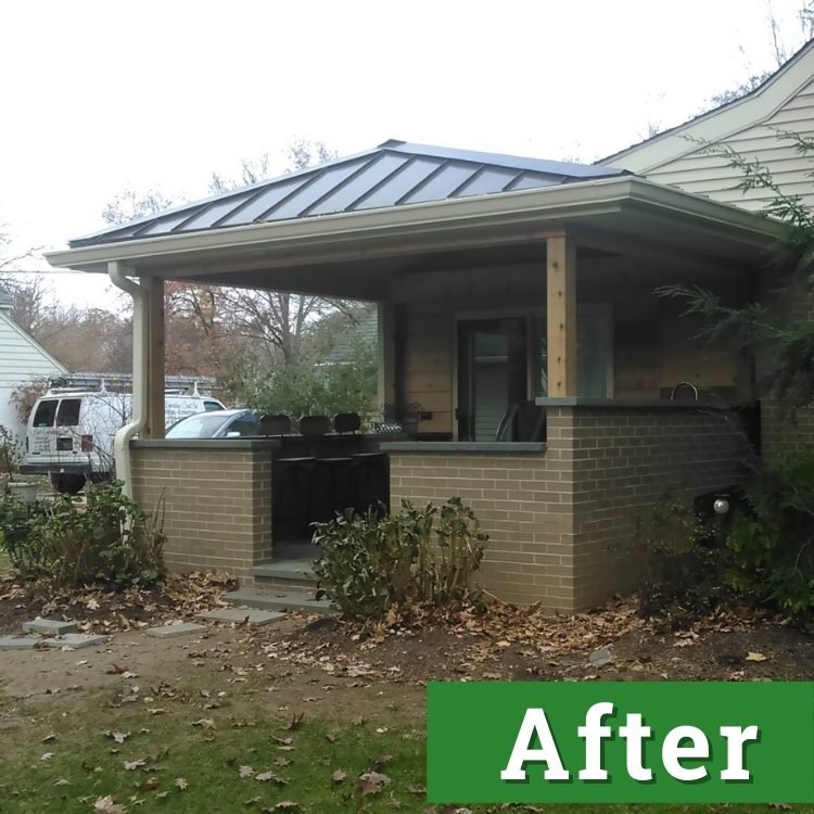 a newly built patio with a partial enclosure and roof