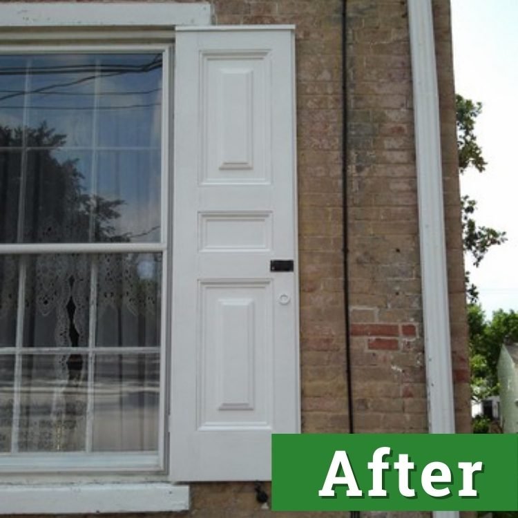 a newly painted white shutter