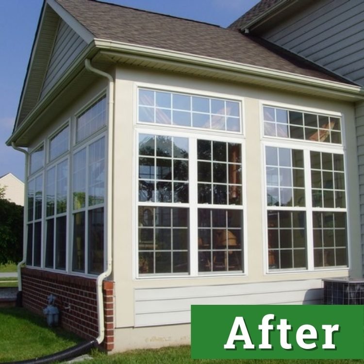 sun shines on the windows of a new sunroom