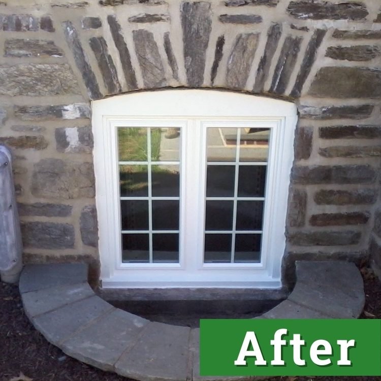 a white basement egress window